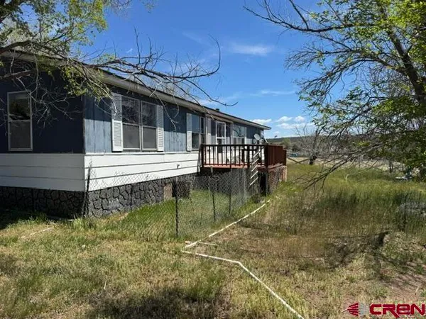 a view of a house with a lake view