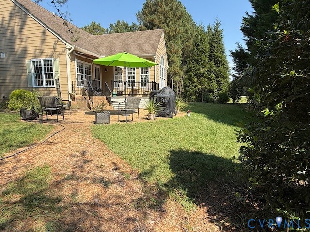 11283 Winding River Road Providence Forge, VA 23140 - Photo 2 of 28 Back yard with nice Patio and Deck, then step down