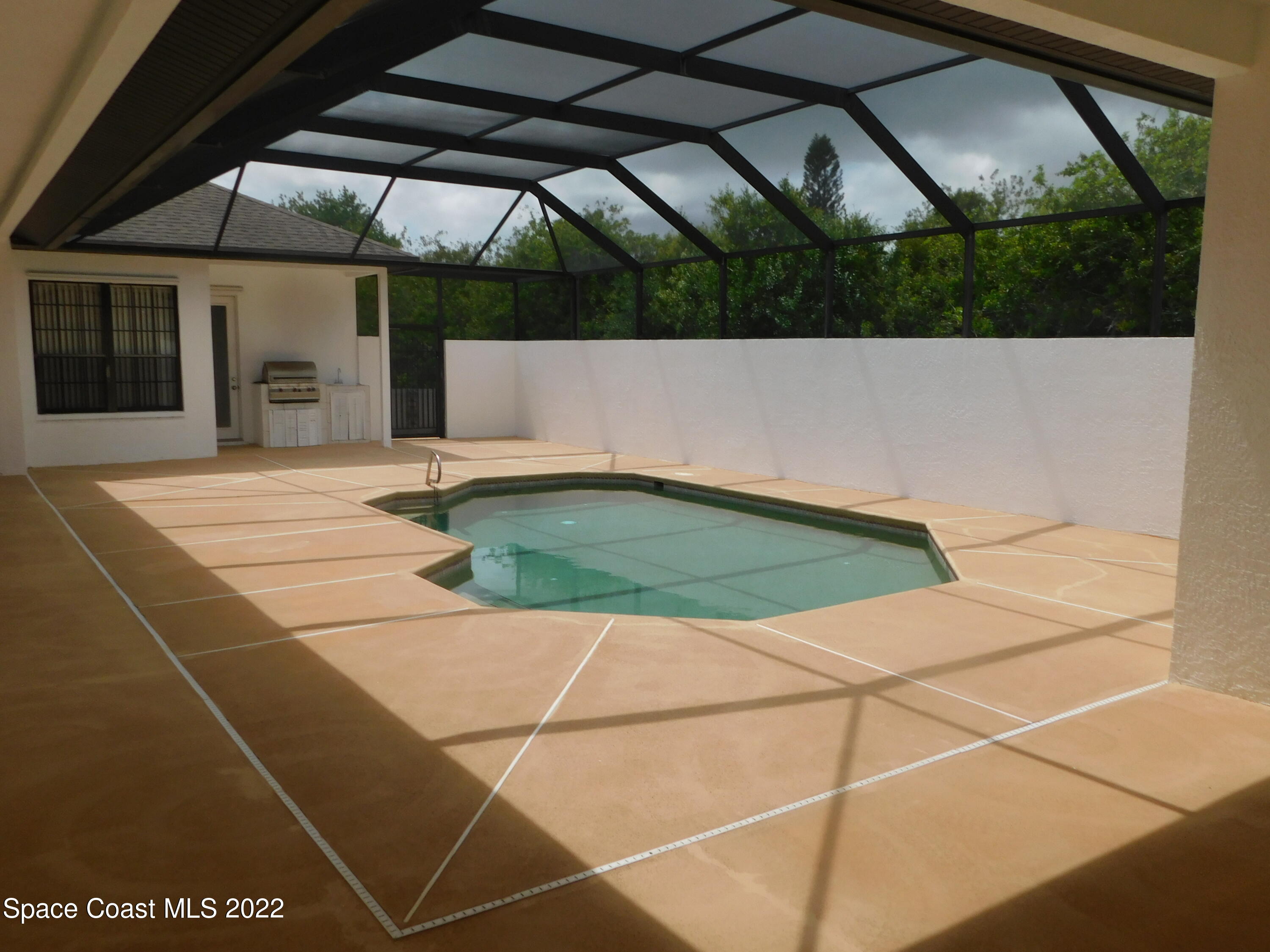 4508 Canard Road Melbourne, FL 32934 - Photo 4 of 34 a view of a backyard of the house