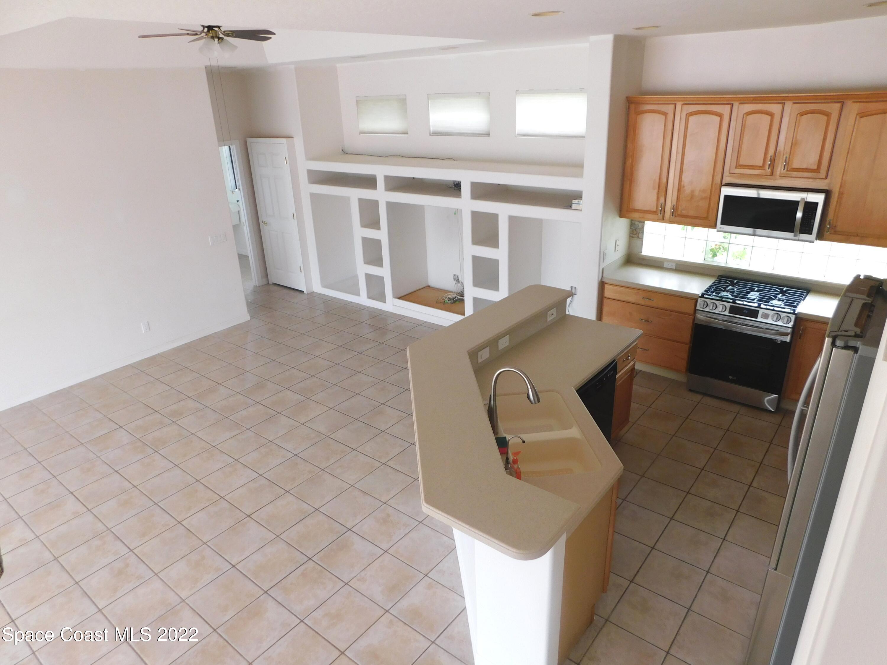 4508 Canard Road Melbourne, FL 32934 - Photo 7 of 34 a workspace with cabinets