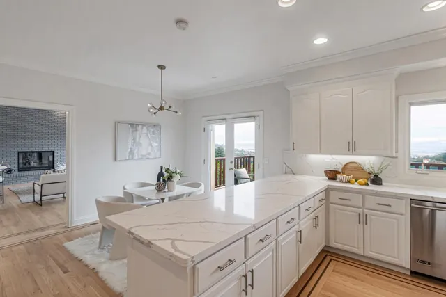 a view of a dining room with furniture window and outside view