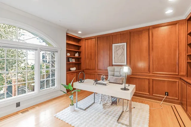 a workspace with furniture window and outside view