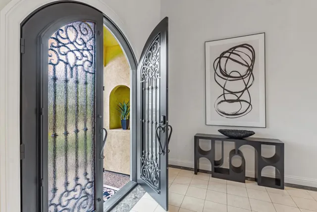 a living room with furniture and a table