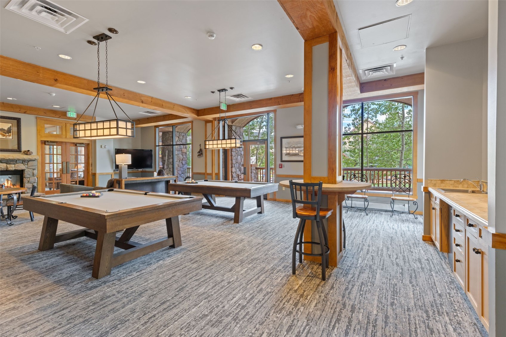 100 Dercum Square, Unit 8394 Keystone, CO 80435 - Photo 34 of 50 Recreation room featuring a fireplace, pool table, and french doors