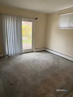 an empty room with a window