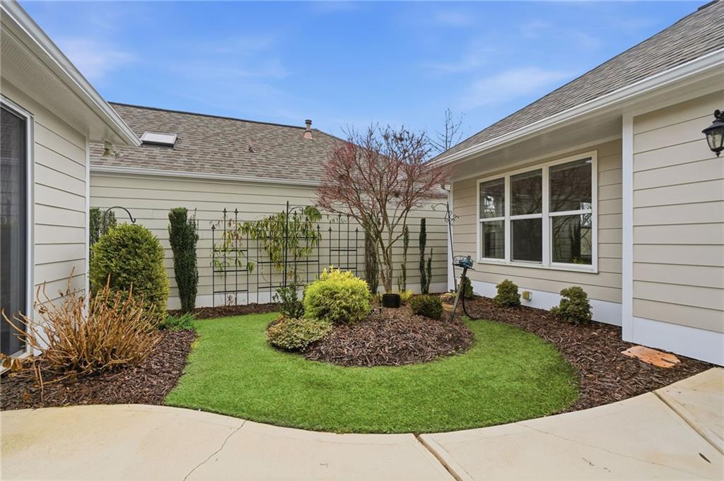 309 Jessica Way Canton, GA 30114 - Photo 20 of 27 a view of a back yard of the house