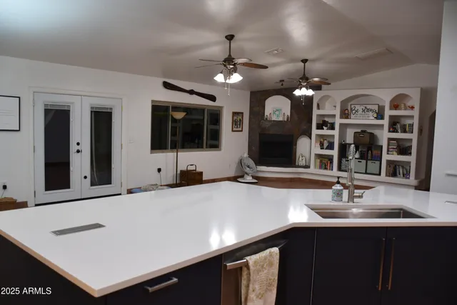 a bathroom with a sink double vanity and a mirror