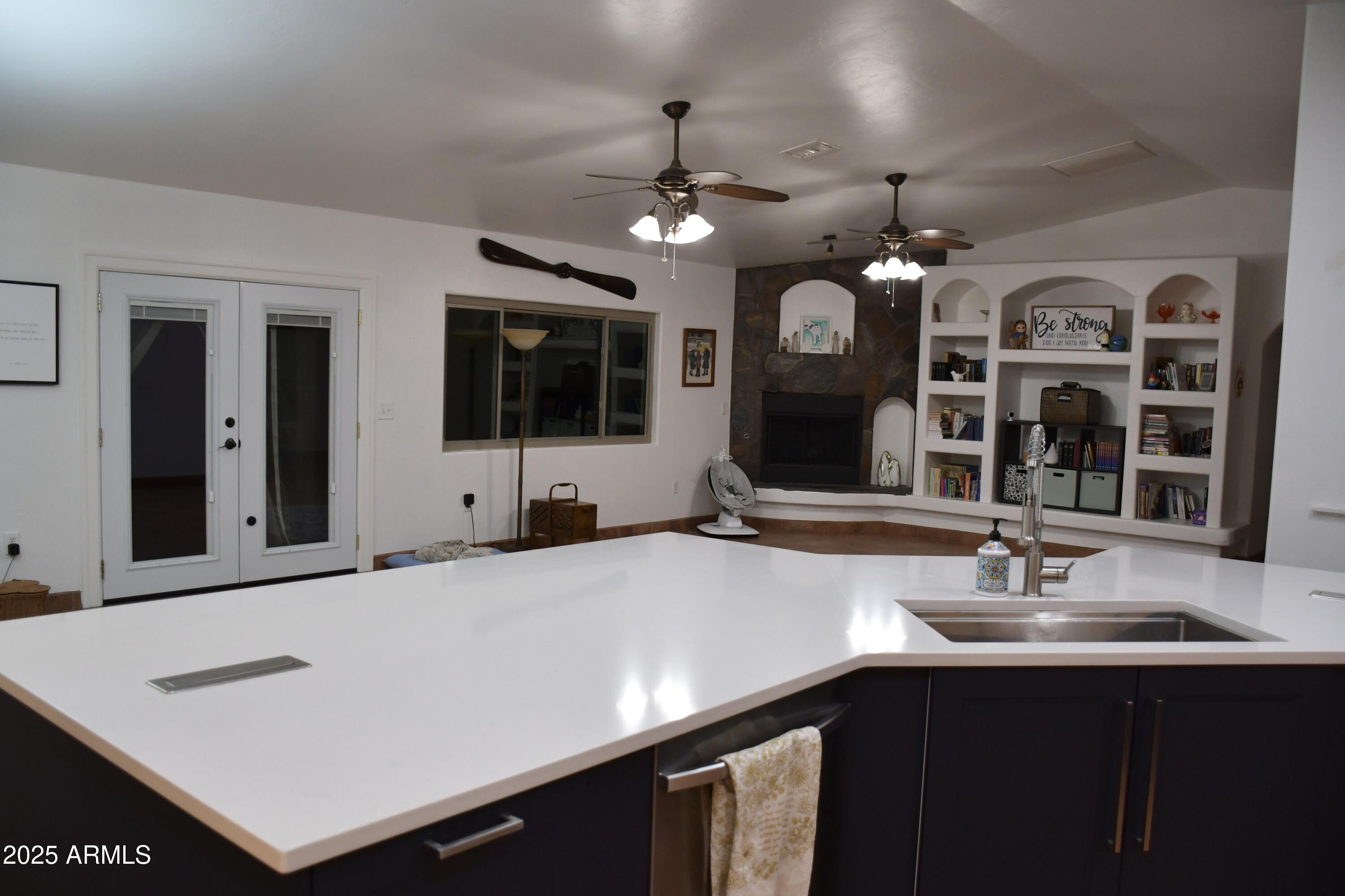 3298 West Monte Vista Trail Benson, AZ 85602 - Photo 13 of 44 a bathroom with a sink and a mirror