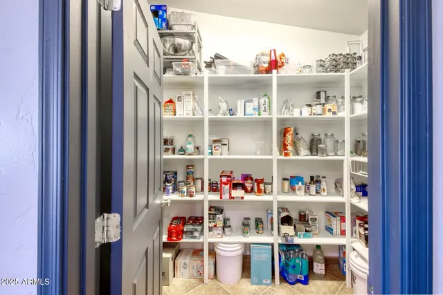 a utility room with dryer washer and closet