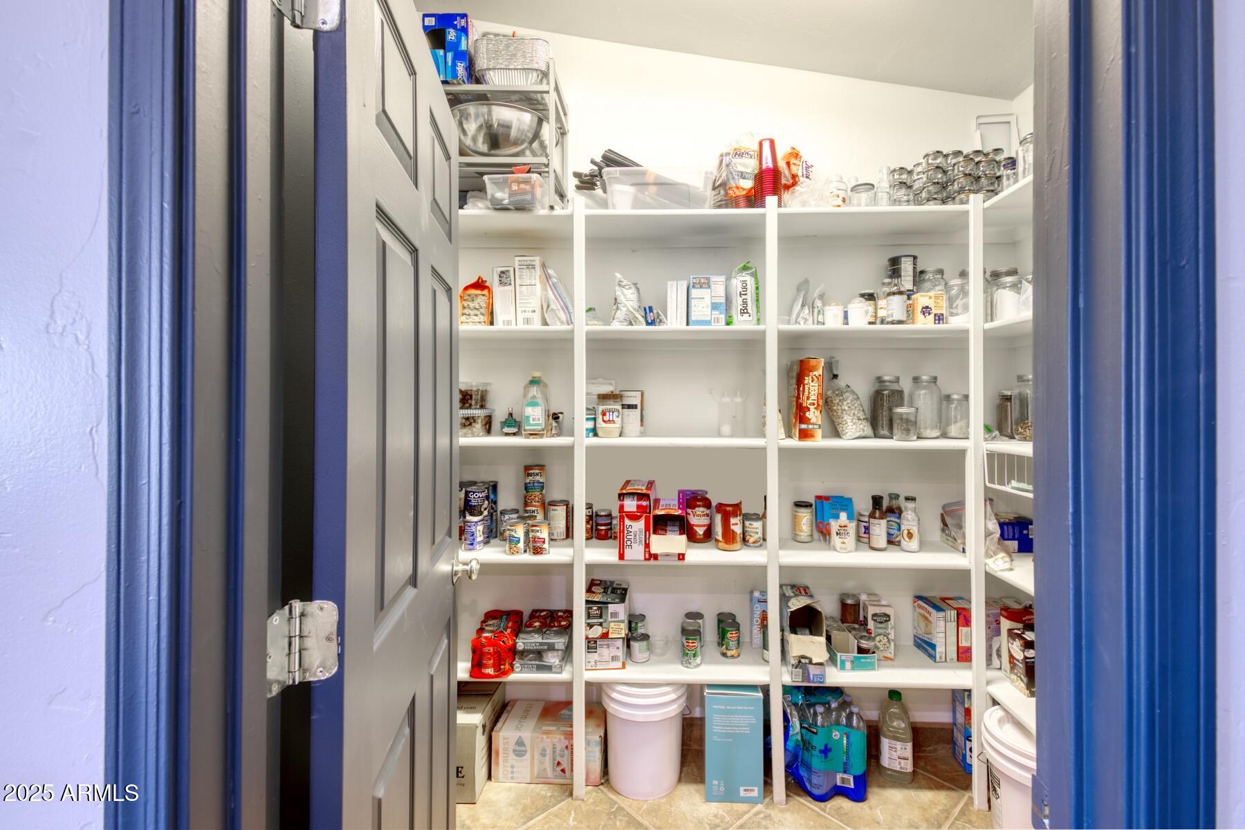 3298 West Monte Vista Trail Benson, AZ 85602 - Photo 15 of 44 a room with storage and utility