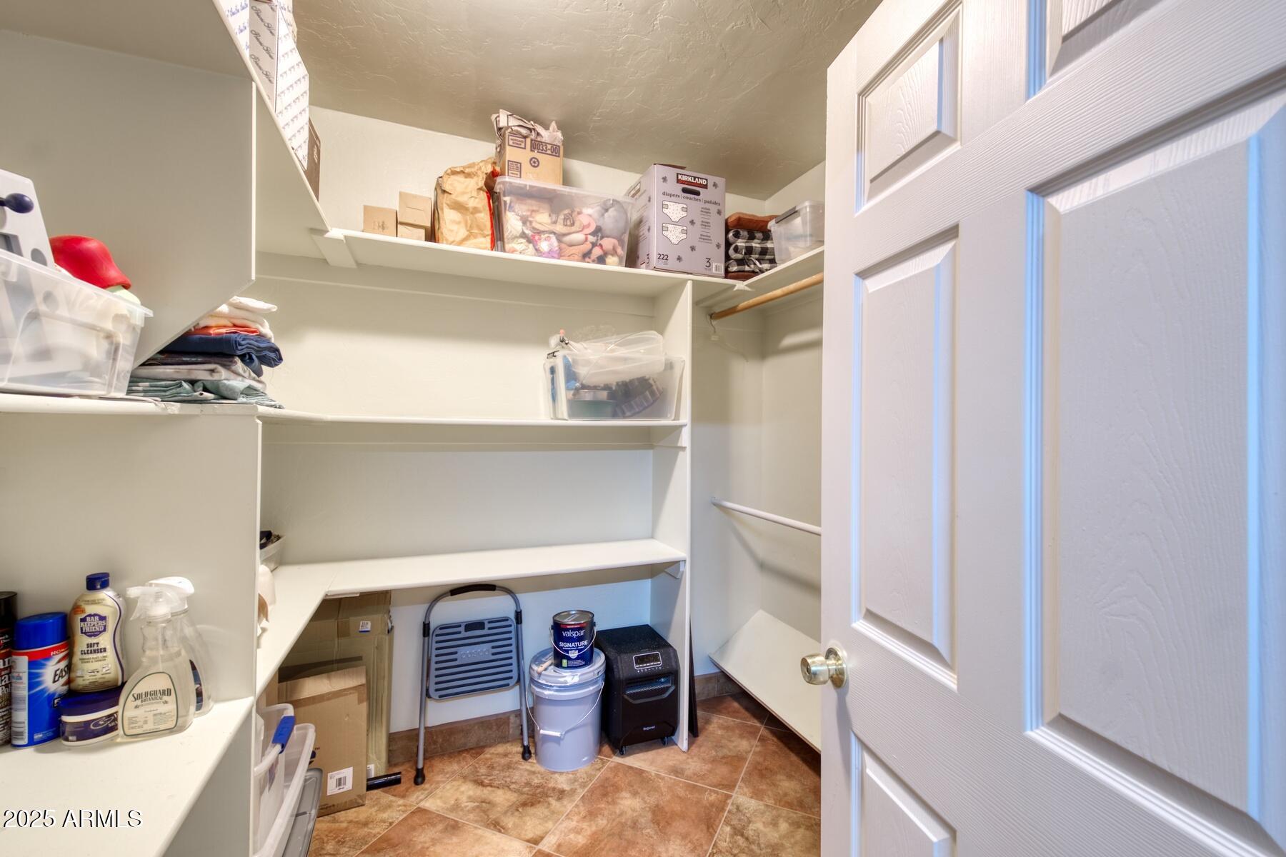 3298 West Monte Vista Trail Benson, AZ 85602 - Photo 17 of 44 a view of room with guitars and closet