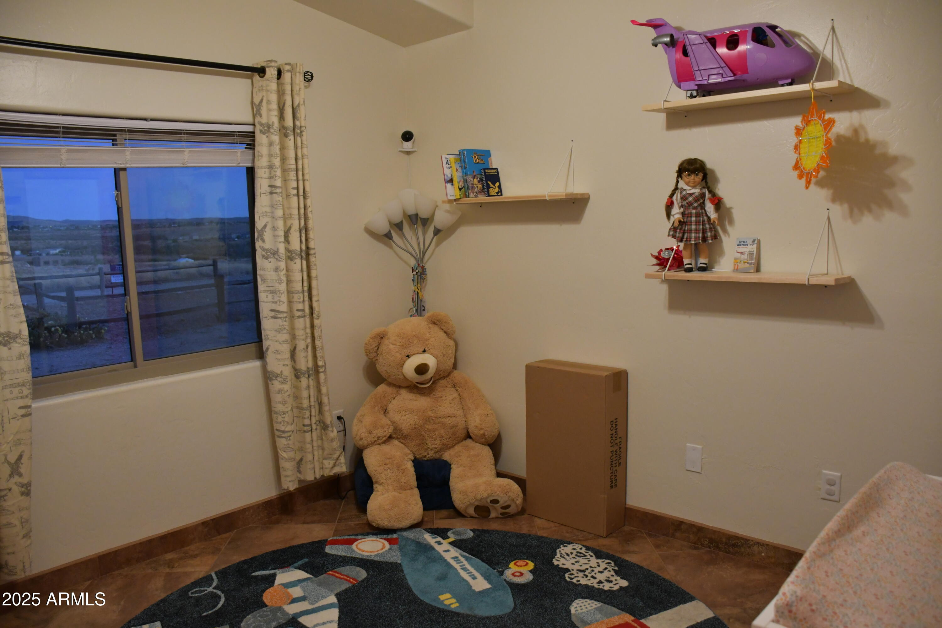 3298 West Monte Vista Trail Benson, AZ 85602 - Photo 24 of 44 a room with wooden floor and cabinets