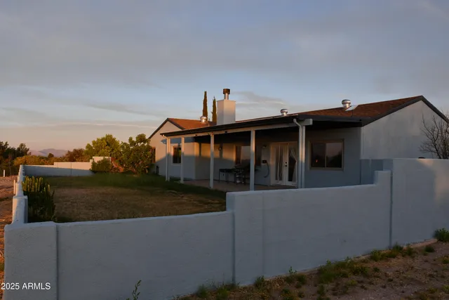a view of swimming pool with a yard