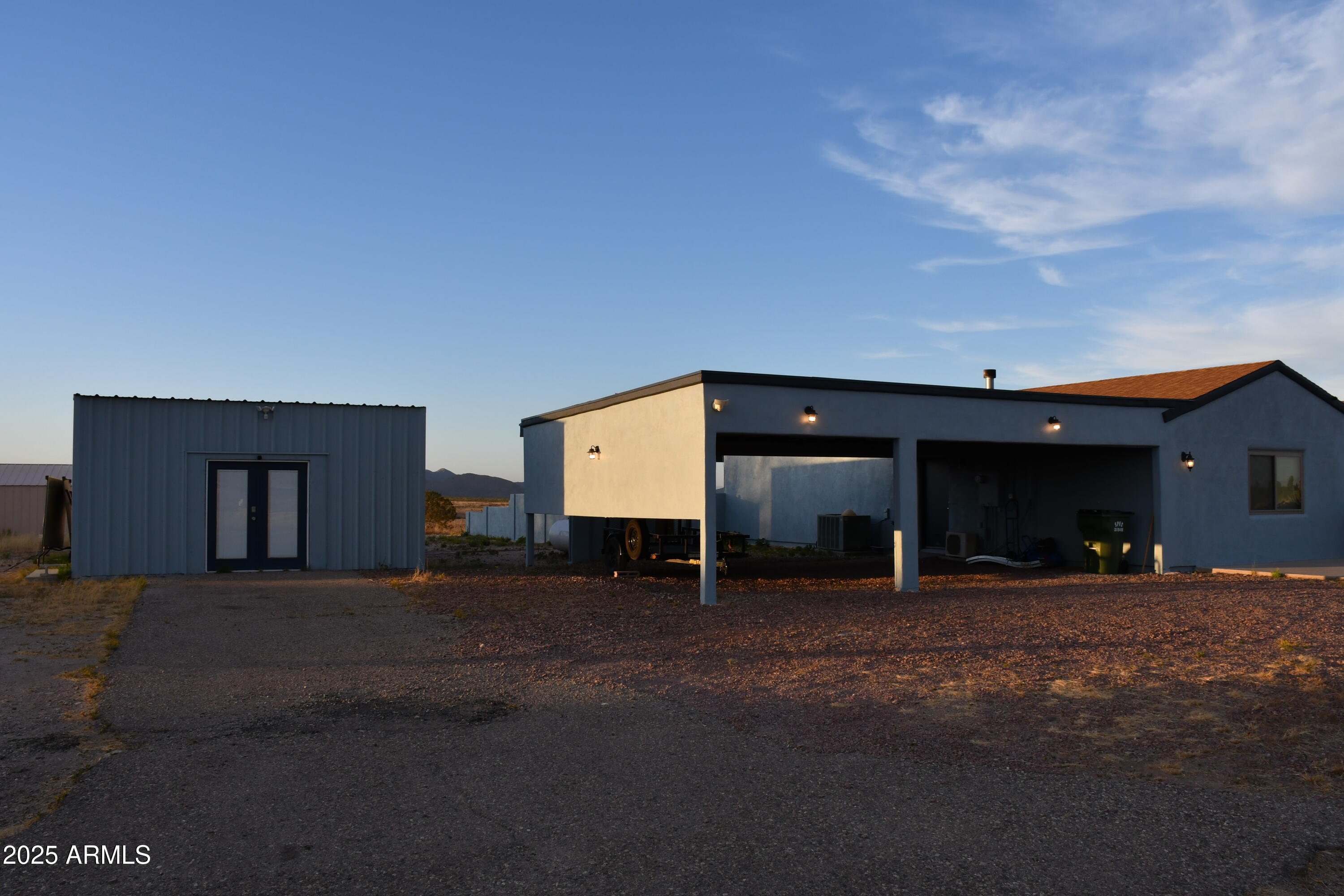 3298 West Monte Vista Trail Benson, AZ 85602 - Photo 35 of 44 a view of a house with a patio