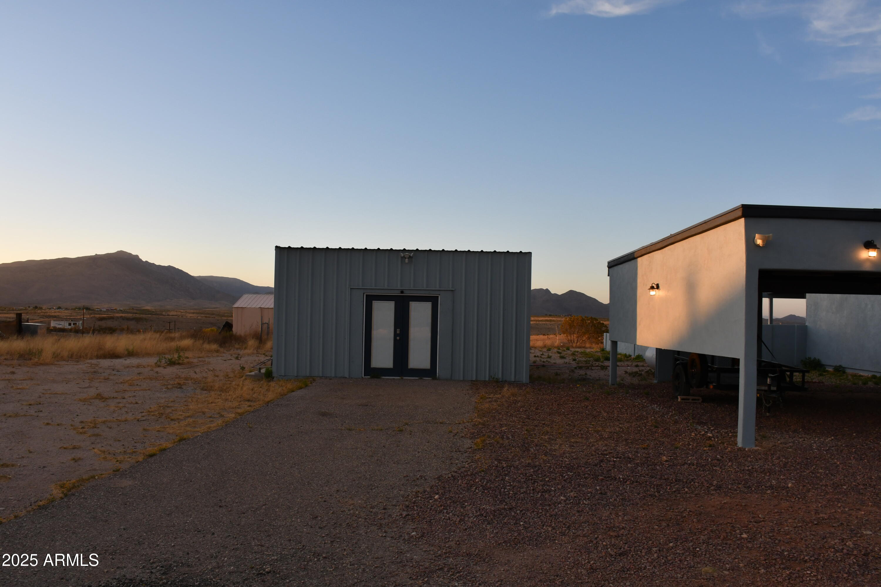 3298 West Monte Vista Trail Benson, AZ 85602 - Photo 36 of 44 a view of a big room with closet and wooden floor
