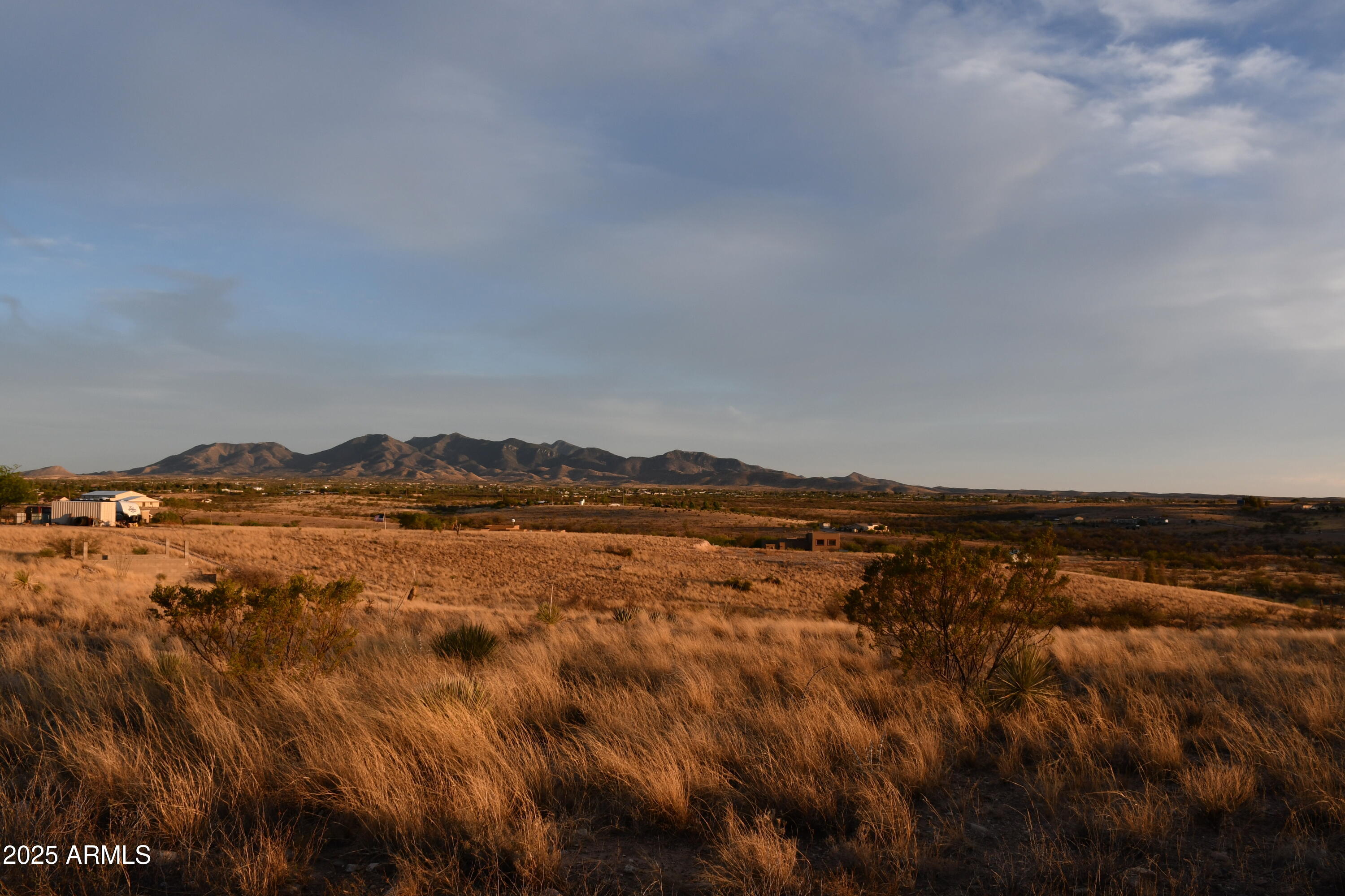 3298 West Monte Vista Trail Benson, AZ 85602 - Photo 43 of 44 a view of an lake and a mountain