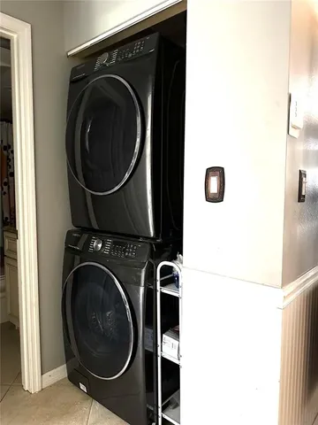 a bathroom with a toilet a sink and a mirror