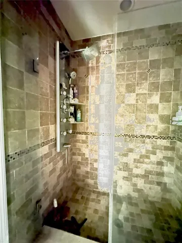 a sign on the side of the tree