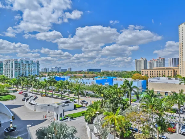 a view of a city with tall buildings