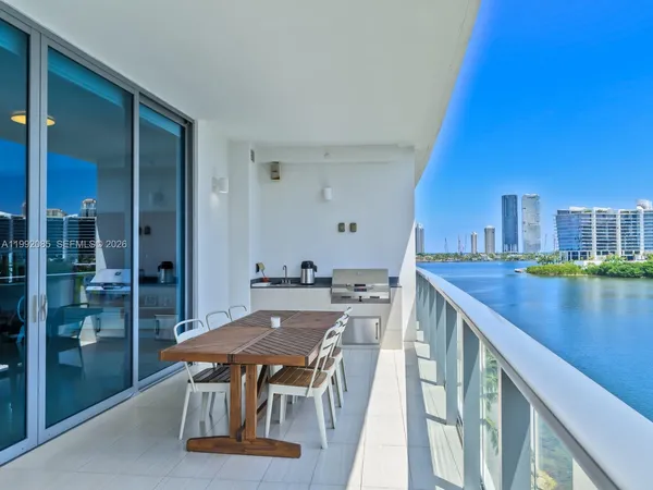 a view of a balcony and chairs