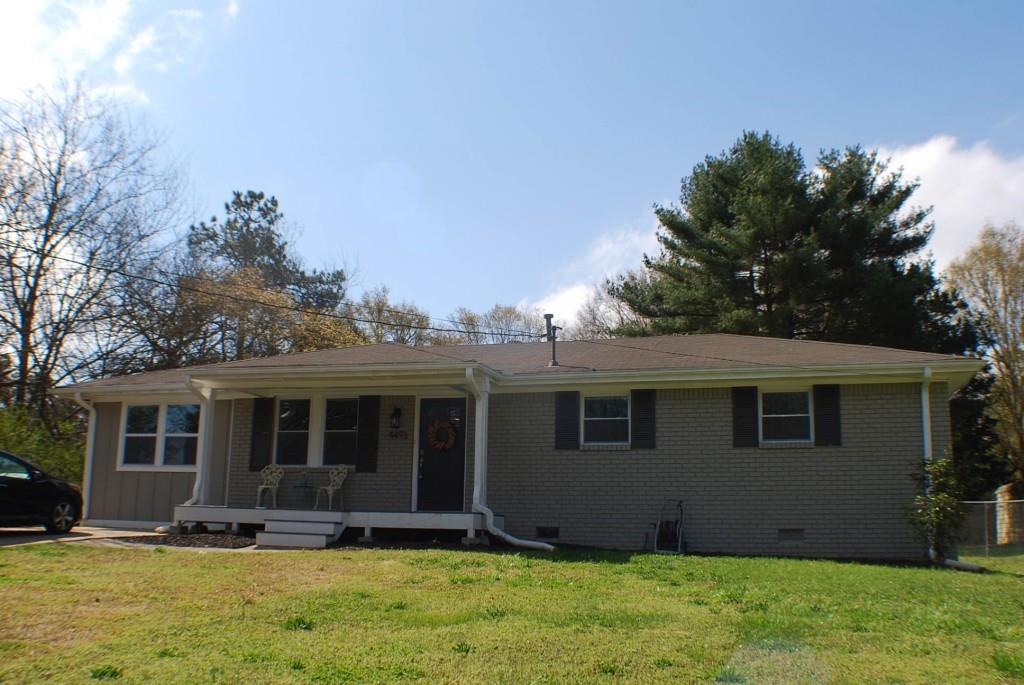 4493 Hiram Lithia Springs Road Southwest Powder Springs, GA 30127 - Photo 1 of 1 a view of a house with a yard