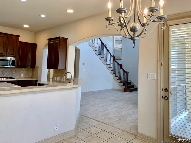 a kitchen with a sink and a window