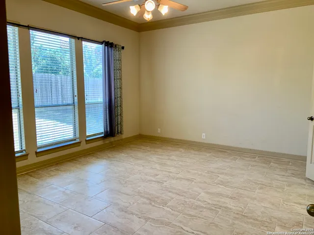 a bathroom with a sink mirror and a bathtub