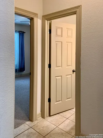 a view of empty room with windows