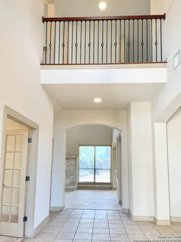 a view of entryway with wooden floor