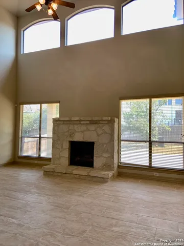 a view of balcony with wooden floor