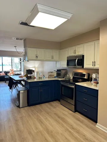 a bed room with bed and window