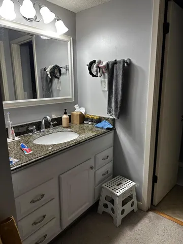 a view of a workspace with furniture