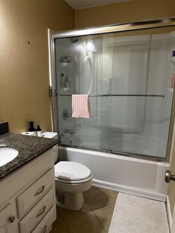 a view of a terrace with seating area