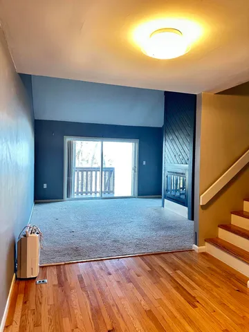 a kitchen with stainless steel appliances sink refrigerator and cabinets