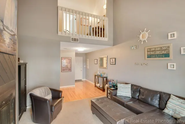 a kitchen with stainless steel appliances granite countertop wooden cabinets sink and stove