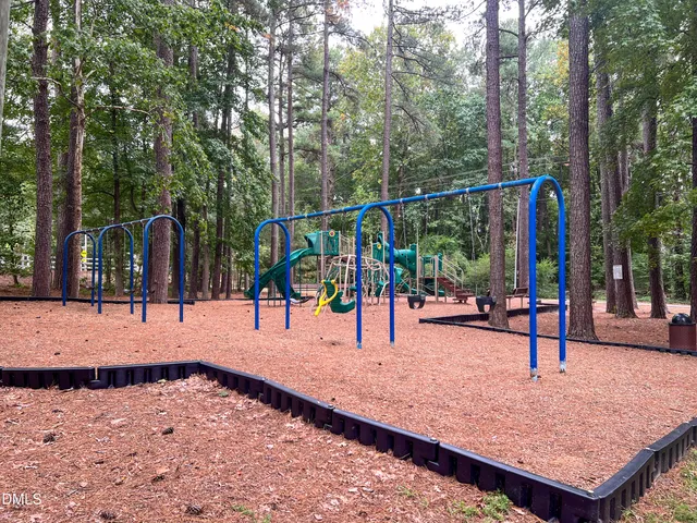a view of a swimming pool with a yard