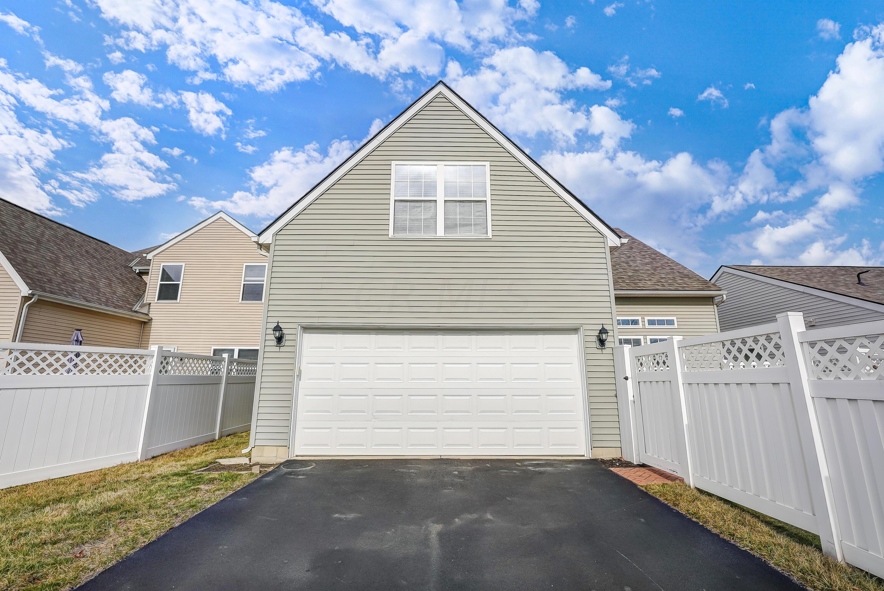 5953 Meehan Road Dublin, OH 43016 - Photo 58 of 63 Rear Entry Driveway