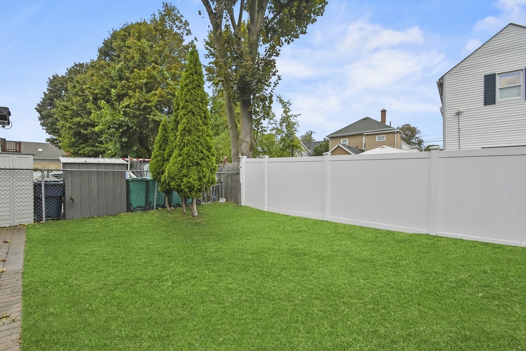 36 Union Street, Unit 36 Woburn, MA 01801 - Photo 13 of 13 a view of a backyard with a garden