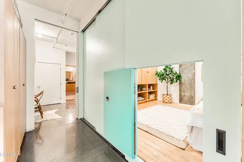 a view of bathroom with a mirror