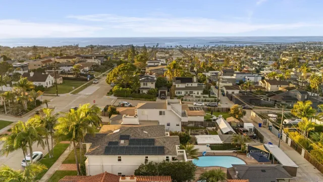 an aerial view of residential building with parking space