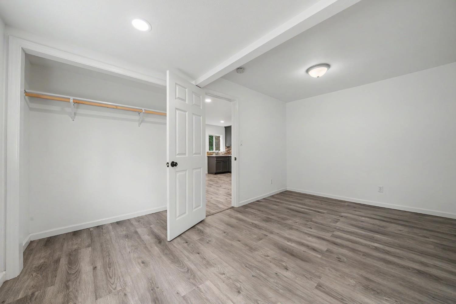 67 Winton Road West Point, CA 95255 - Photo 14 of 28 a view of empty room with wooden floor