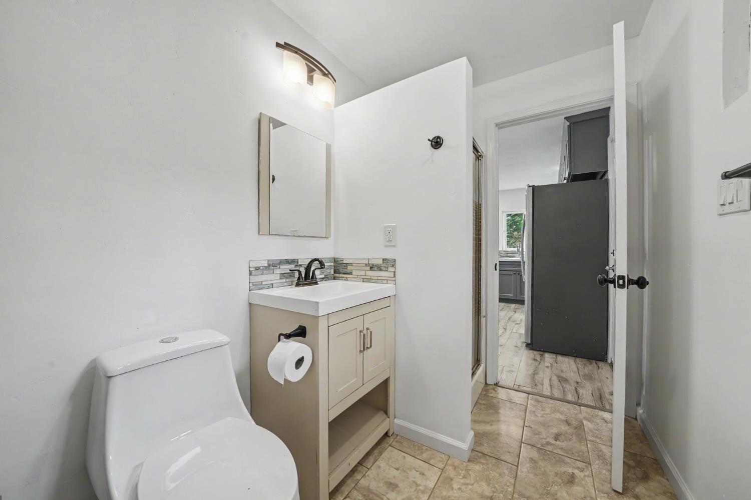 67 Winton Road West Point, CA 95255 - Photo 17 of 28 a bathroom with a sink a toilet and shower