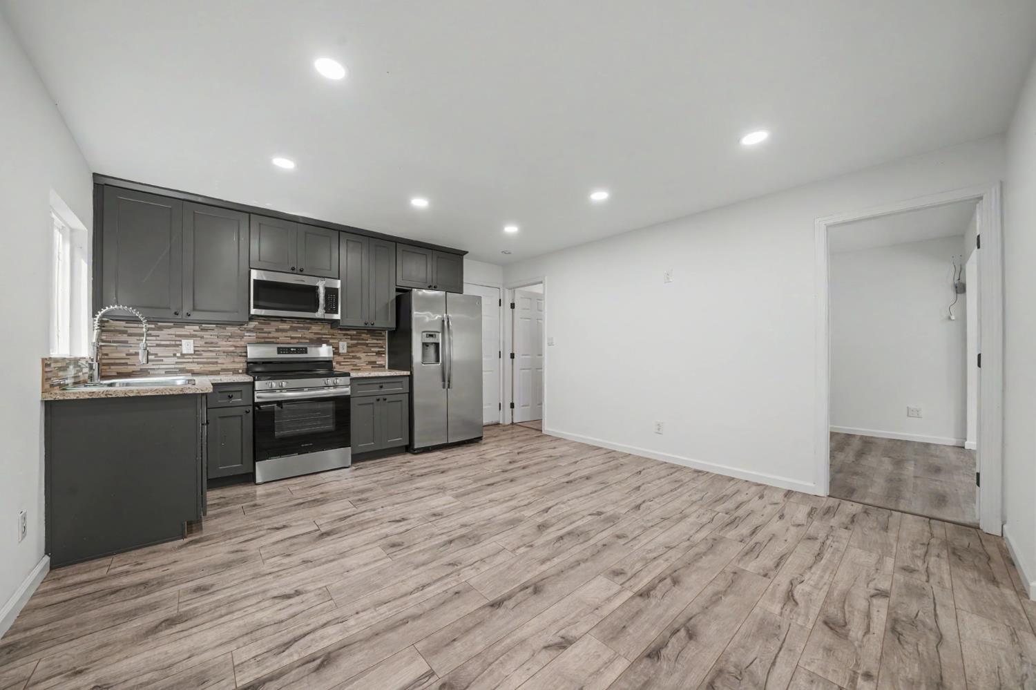 67 Winton Road West Point, CA 95255 - Photo 7 of 28 a kitchen with stainless steel appliances a refrigerator and a microwave