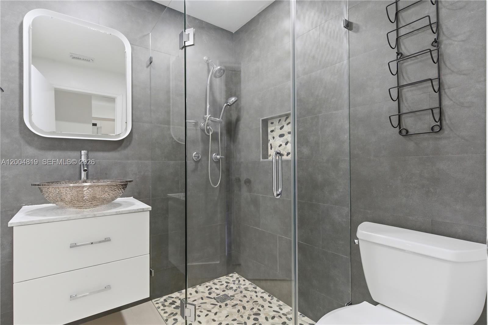 3725 Southwest 153rd Court Miami, FL 33185 - Photo 13 of 28 a bathroom with a toilet sink and shower