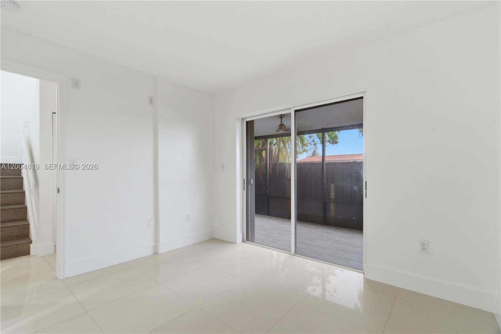 3725 Southwest 153rd Court Miami, FL 33185 - Photo 17 of 28 an empty room with mirror