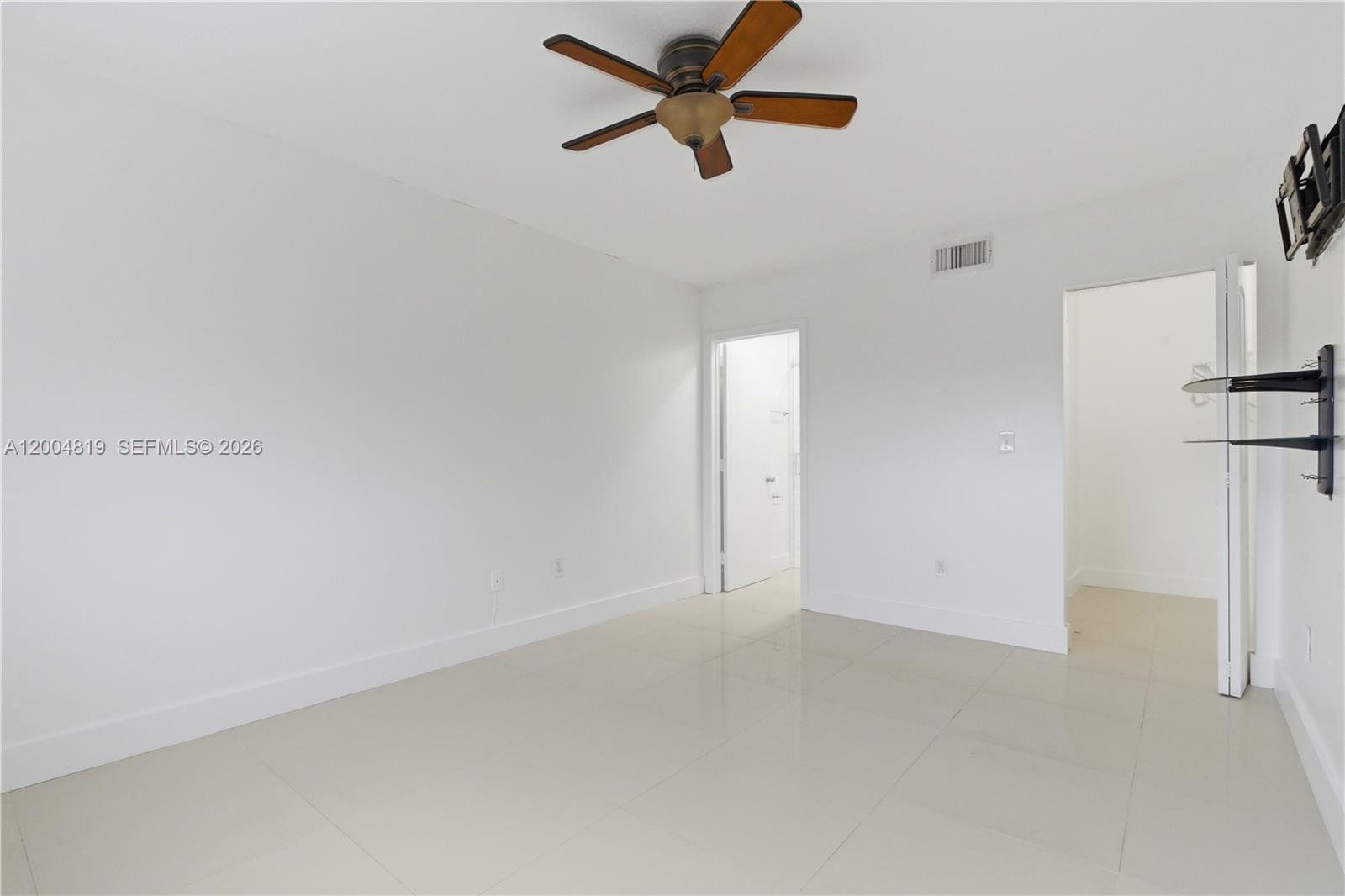 3725 Southwest 153rd Court Miami, FL 33185 - Photo 18 of 28 a view of an empty room