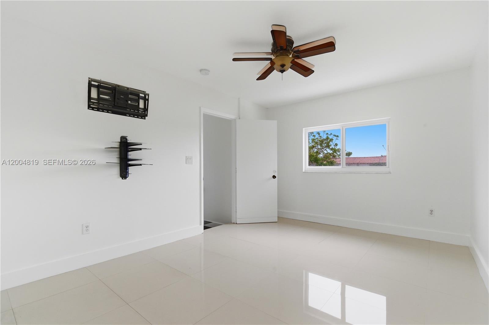 3725 Southwest 153rd Court Miami, FL 33185 - Photo 21 of 28 a view of room with ceiling fan