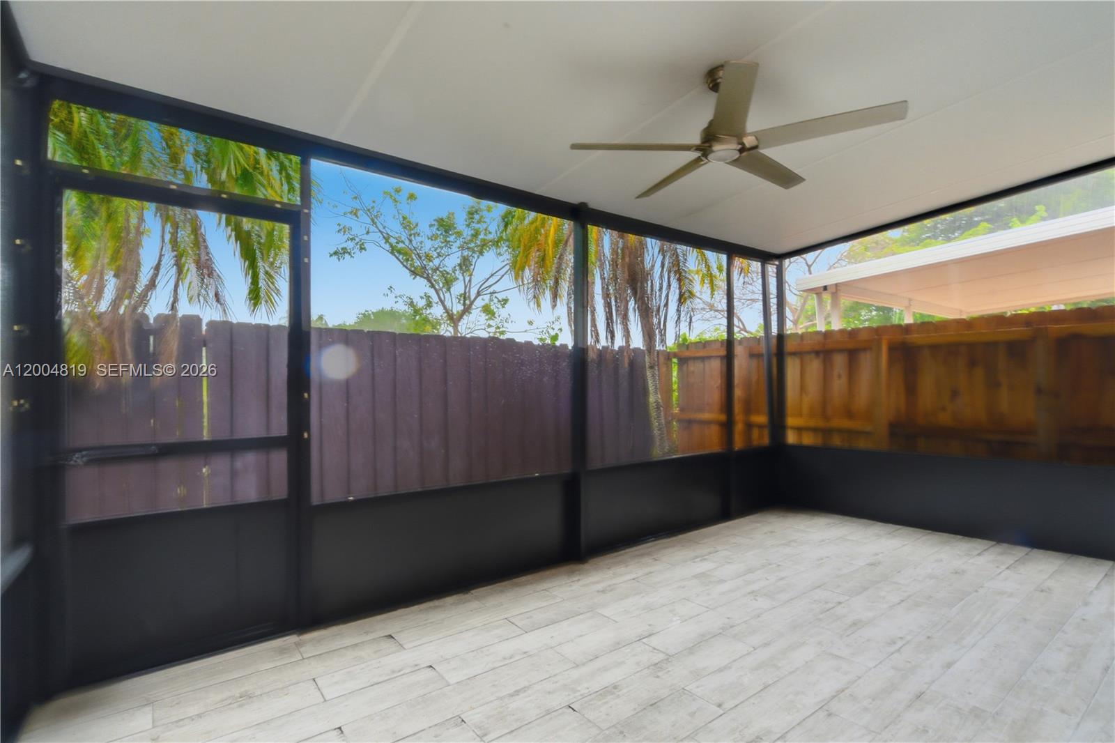 3725 Southwest 153rd Court Miami, FL 33185 - Photo 27 of 28 a view of an empty room with a window