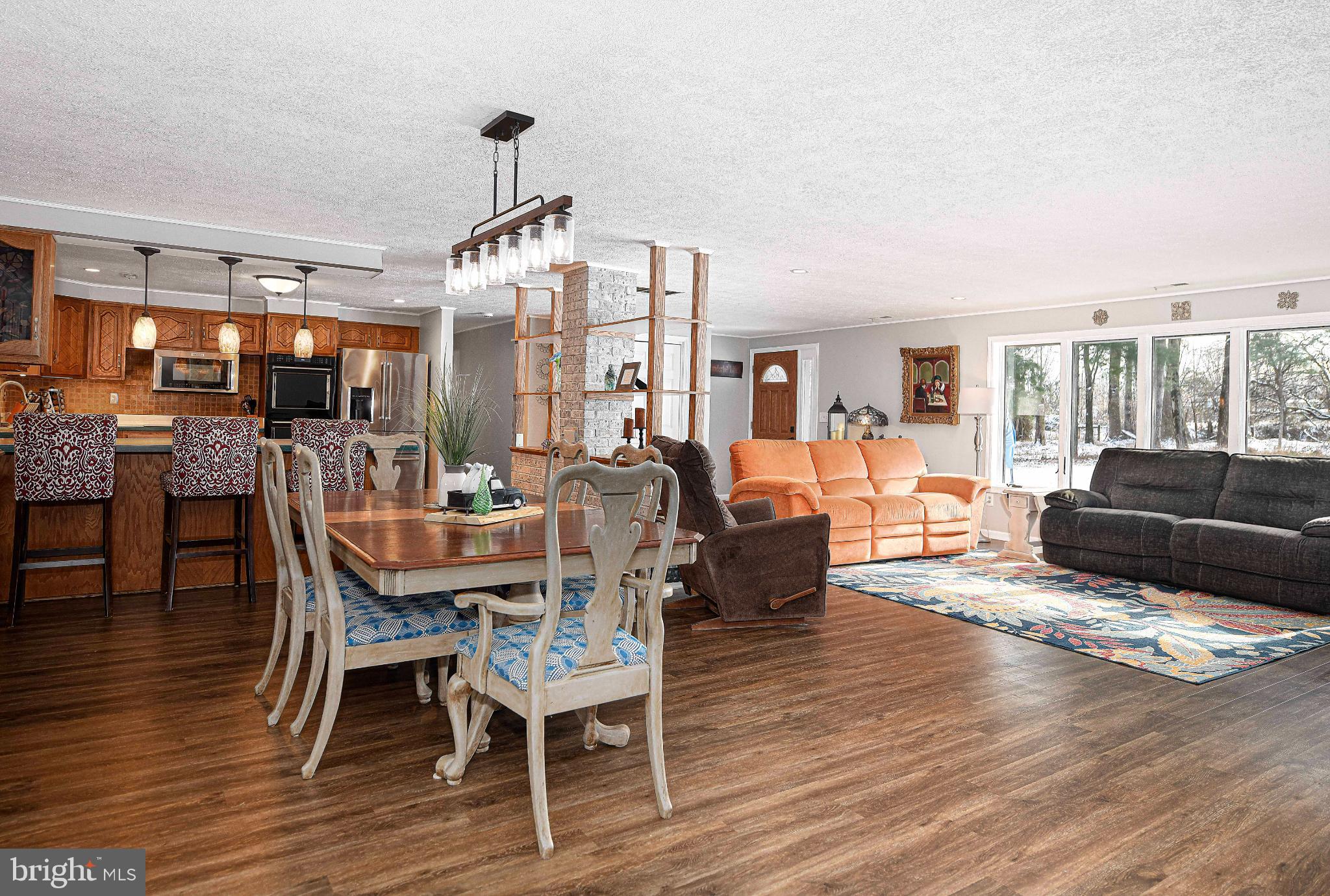 1221 Prospect Mill Road Bel Air, MD 21015 - Photo 26 of 81 a view of a dining room with furniture window and wooden floor