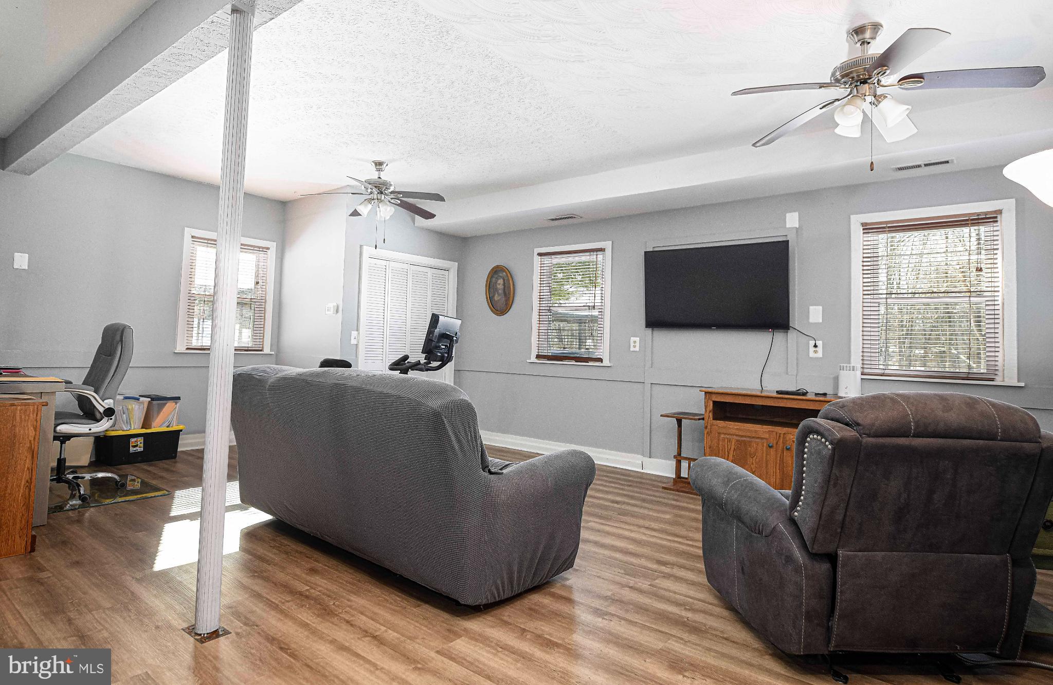 1221 Prospect Mill Road Bel Air, MD 21015 - Photo 45 of 81 a living room with furniture and a flat screen tv